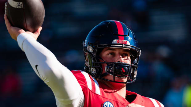 Ole Miss Rebels quarterback Jaxson Dart warms up ahead of Week 12 home matchup versus the ULM Warhawks (2023). 